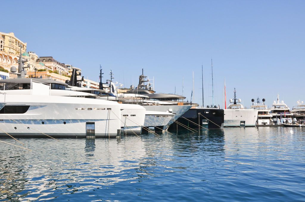 Yachts and crew on the docks at the 2026 Monaco Yacht Show in Port Hercule, Monaco.