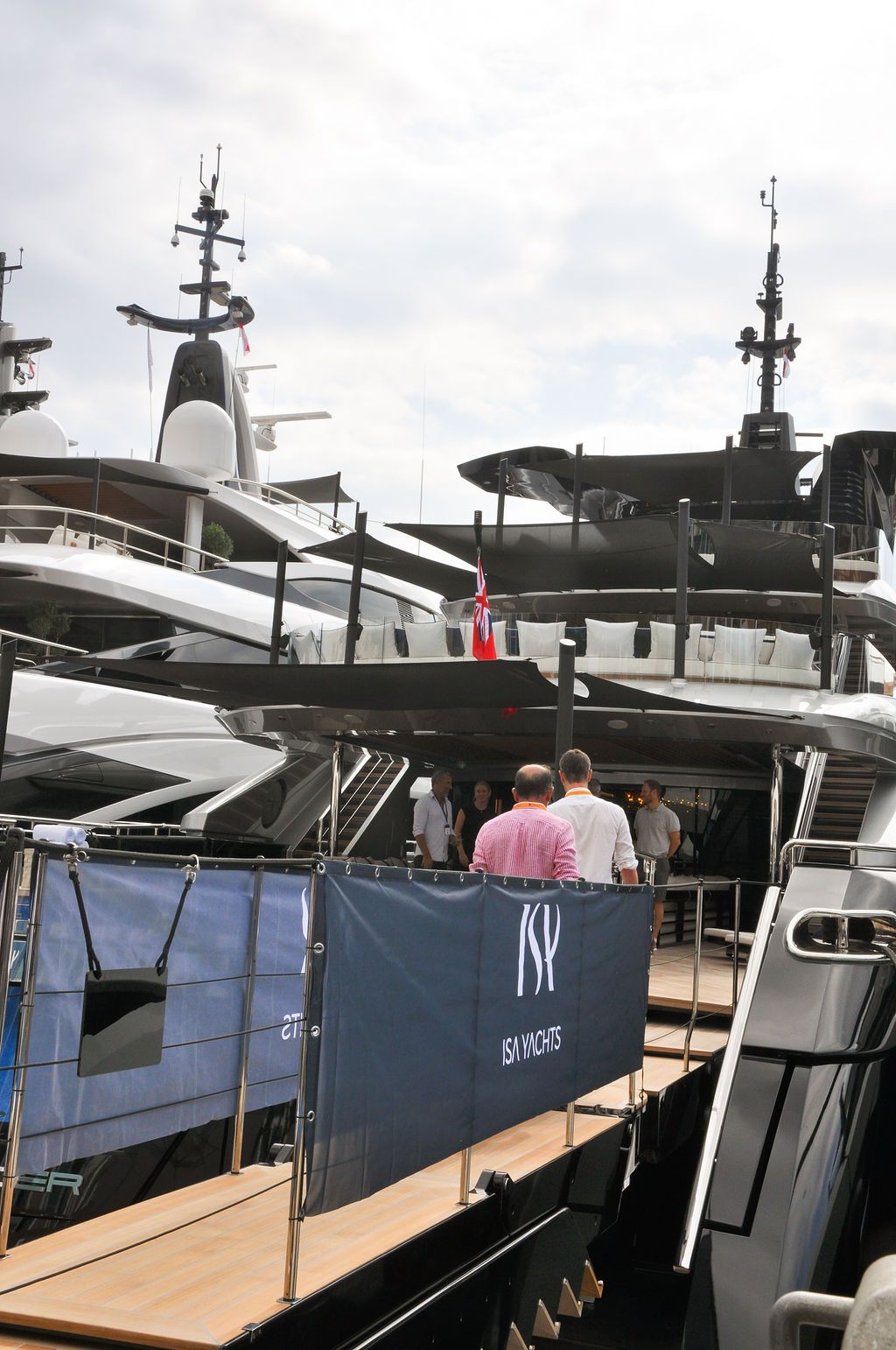 Yachts and crew on the docks at the 2026 Monaco Yacht Show in Port Hercule, Monaco.