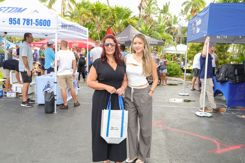 Guests and exhibitors at The Triton's Fall Triton Expo at Bahia Mar Yachting Center.