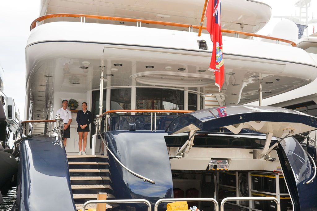 Yachts and crew on the docks at the 2026 Monaco Yacht Show in Port Hercule, Monaco.