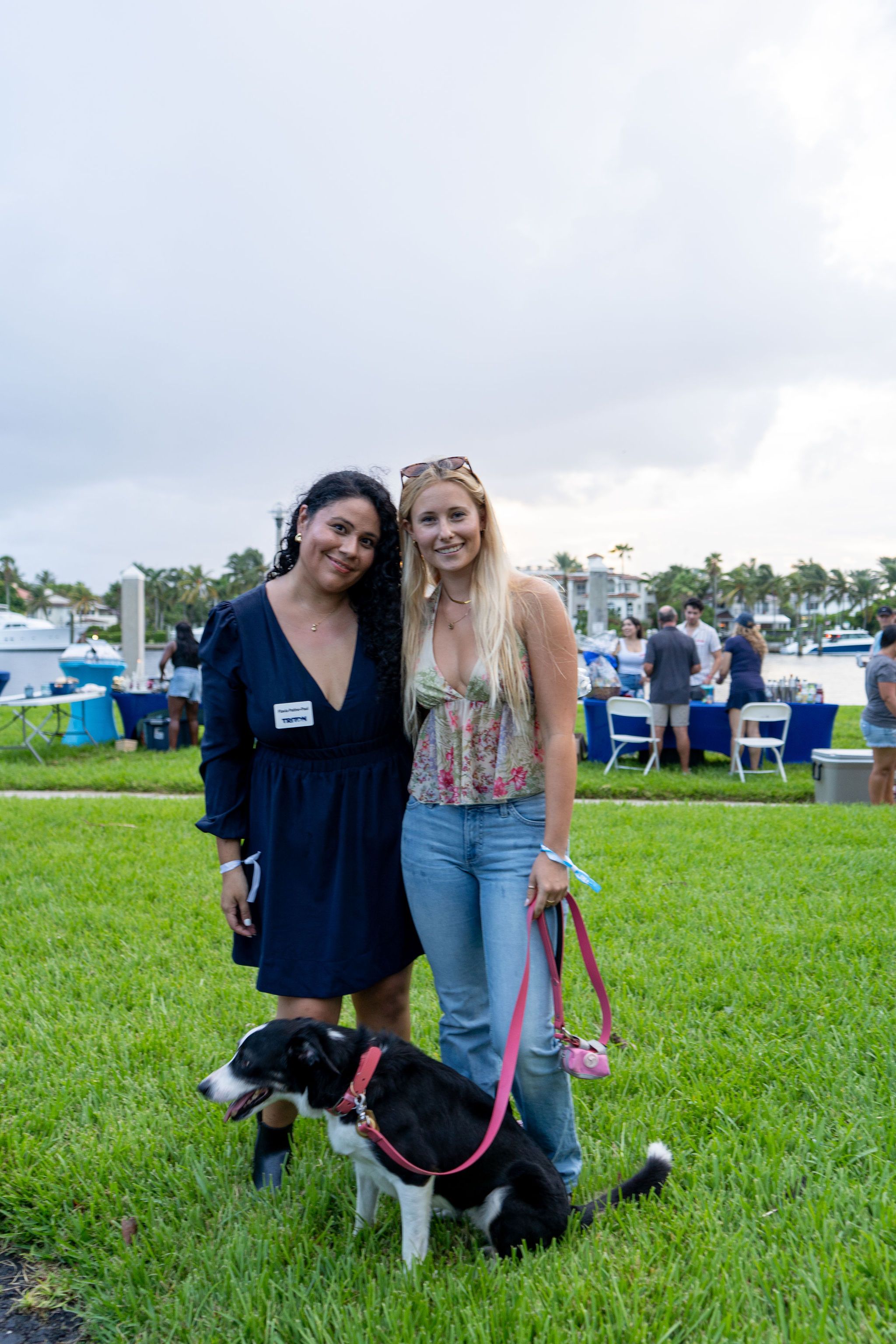Guests in candid and group photos at The Triton's Fall Triton Expo at Bahia Mar Yachting Center.