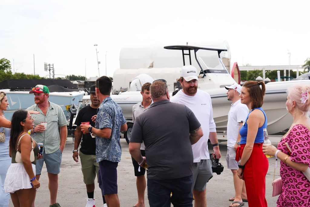 Guests networking at The Triton's Crew, Captains & Connections event at Nautical Ventures Marina.