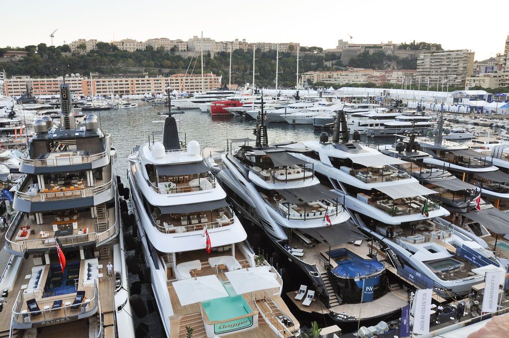 Yachts and crew on the docks at the 2026 Monaco Yacht Show in Port Hercule, Monaco.