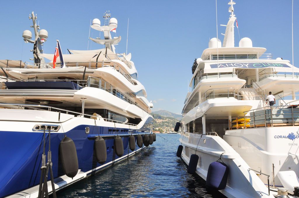 Yachts and crew on the docks at the 2026 Monaco Yacht Show in Port Hercule, Monaco.