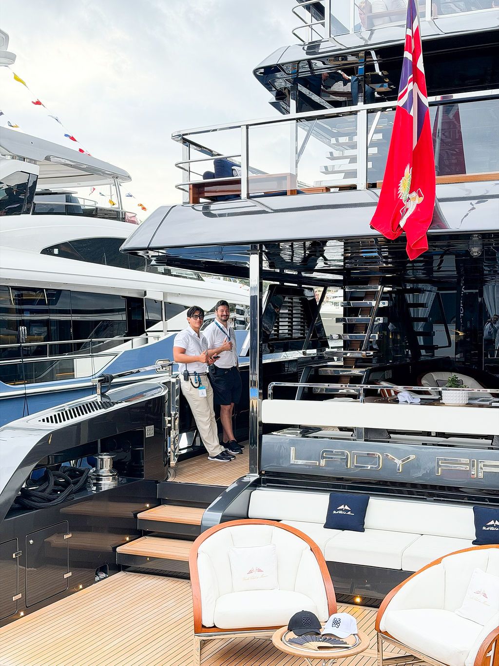 Yachts and crew on the docks at the 2026 Monaco Yacht Show in Port Hercule, Monaco.