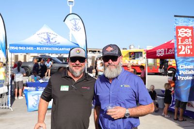 Guests networking at The Triton's Crew, Captains & Connections event at Nautical Ventures Marina.