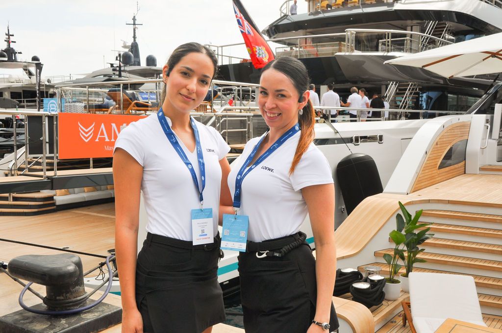 Yachts and crew on the docks at the 2026 Monaco Yacht Show in Port Hercule, Monaco.