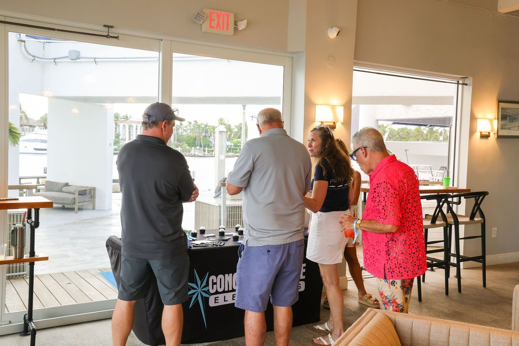 Guests and exhibitors at The Triton's Fall Triton Expo at Bahia Mar Yachting Center.