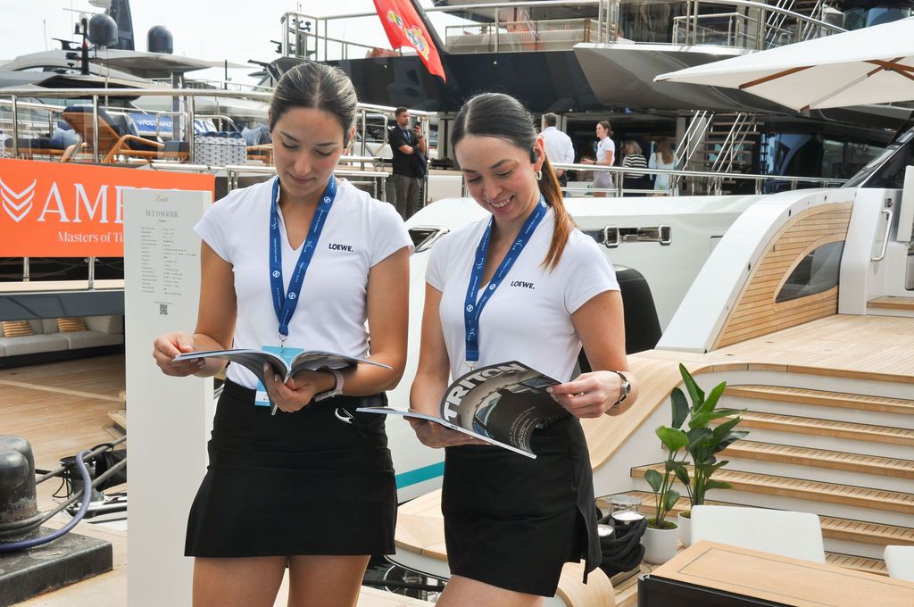 Yachts and crew on the docks at the 2026 Monaco Yacht Show in Port Hercule, Monaco.