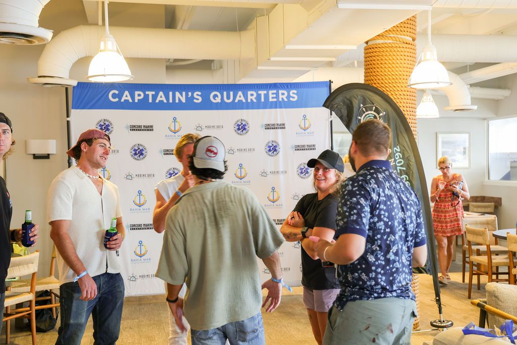 Guests and exhibitors at The Triton's Fall Triton Expo at Bahia Mar Yachting Center.