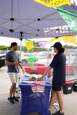 Guests networking at The Triton's Crew, Captains & Connections event at Nautical Ventures Marina.