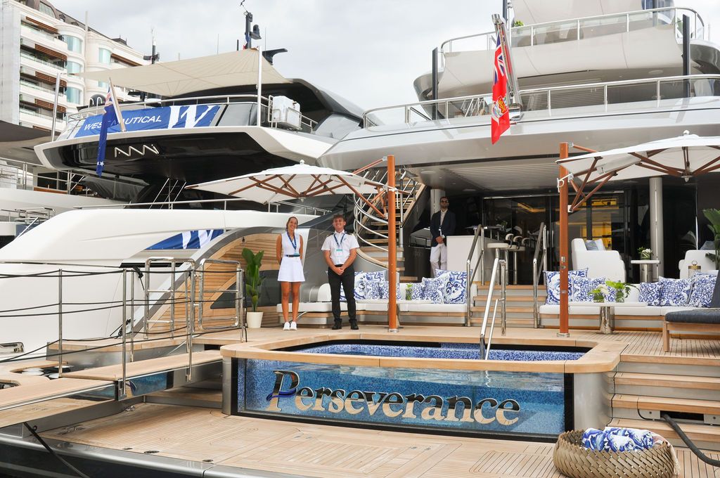 Yachts and crew on the docks at the 2026 Monaco Yacht Show in Port Hercule, Monaco.