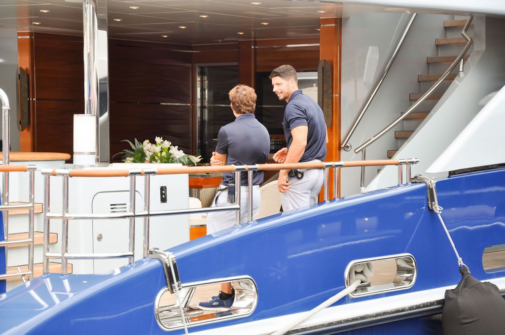 Yachts and crew on the docks at the 2026 Monaco Yacht Show in Port Hercule, Monaco.