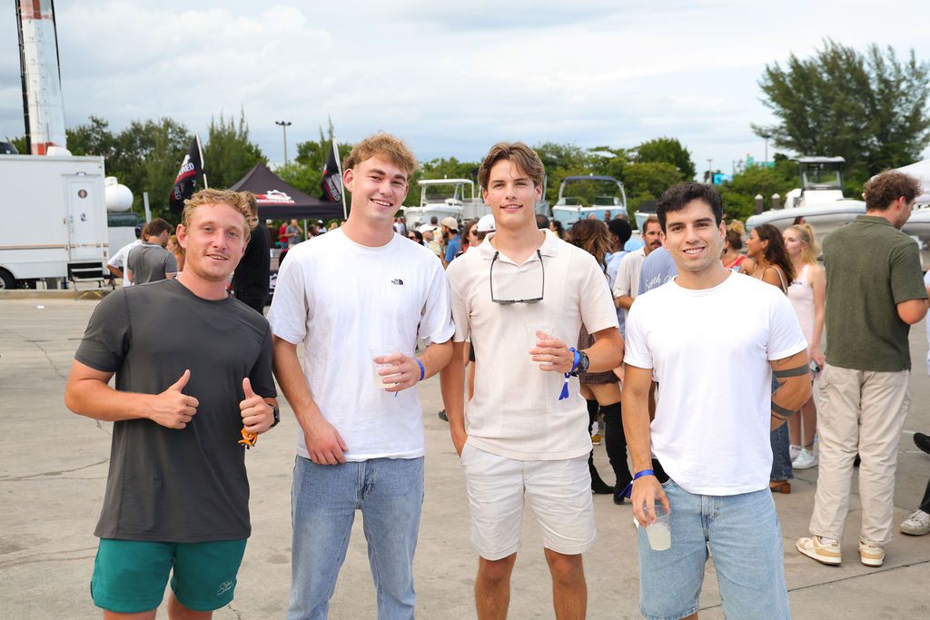 Guests networking at The Triton's Crew, Captains & Connections event at Nautical Ventures Marina.