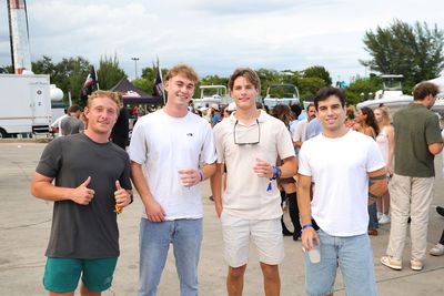 Guests networking at The Triton's Crew, Captains & Connections event at Nautical Ventures Marina.