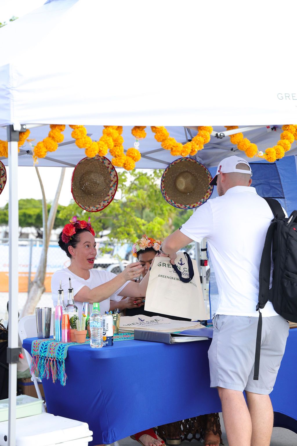 Guests networking at The Triton's Crew, Captains & Connections event at Nautical Ventures Marina.