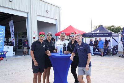 Guests networking at The Triton's Crew, Captains & Connections event at Nautical Ventures Marina.