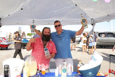 Guests networking at The Triton's Crew, Captains & Connections event at Nautical Ventures Marina.