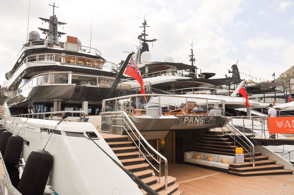 Yachts and crew on the docks at the 2026 Monaco Yacht Show in Port Hercule, Monaco.