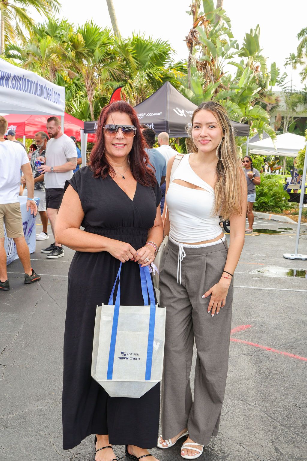 Guests and exhibitors at The Triton's Fall Triton Expo at Bahia Mar Yachting Center.