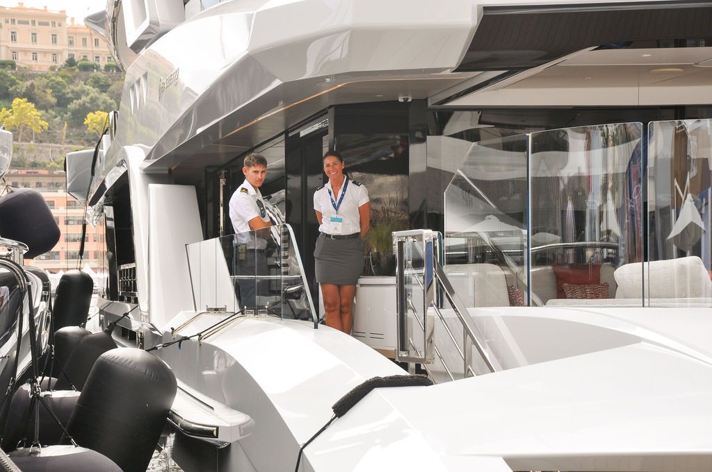 Yachts and crew on the docks at the 2026 Monaco Yacht Show in Port Hercule, Monaco.