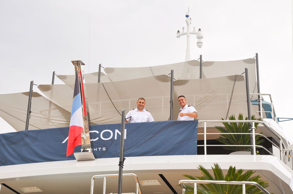 Yachts and crew on the docks at the 2026 Monaco Yacht Show in Port Hercule, Monaco.