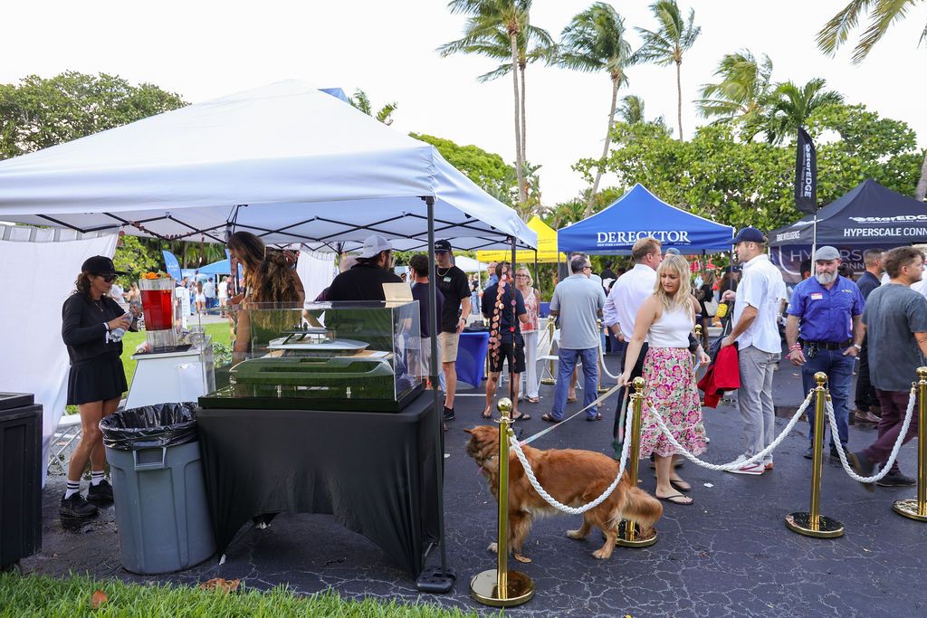 Guests and exhibitors at The Triton's Fall Triton Expo at Bahia Mar Yachting Center.