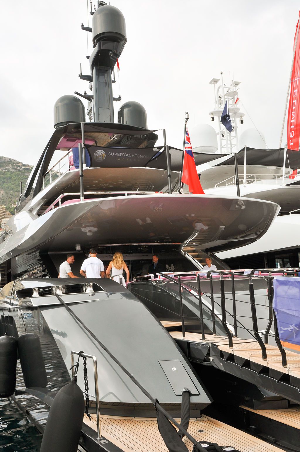 Yachts and crew on the docks at the 2026 Monaco Yacht Show in Port Hercule, Monaco.