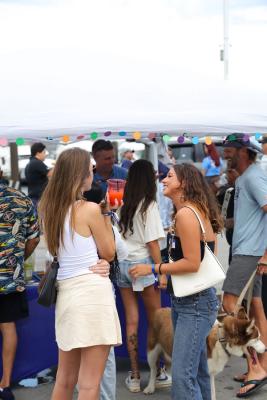 Guests networking at The Triton's Crew, Captains & Connections event at Nautical Ventures Marina.