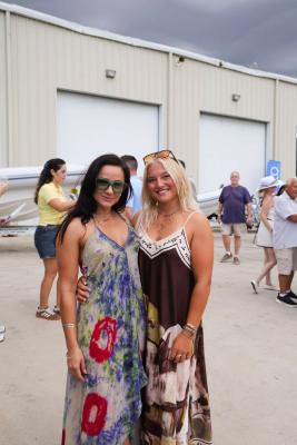 Guests networking at The Triton's Crew, Captains & Connections event at Nautical Ventures Marina.