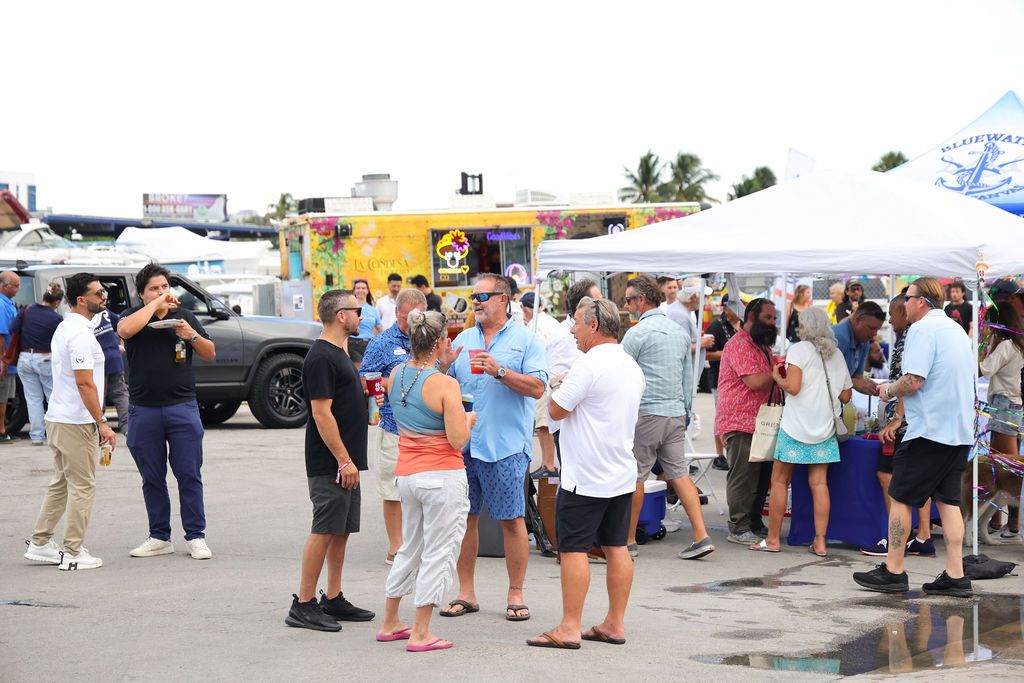 Guests networking at The Triton's Crew, Captains & Connections event at Nautical Ventures Marina.
