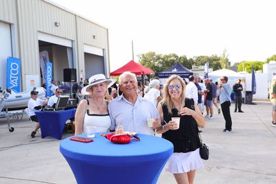 Guests networking at The Triton's Crew, Captains & Connections event at Nautical Ventures Marina.