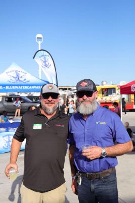 Guests networking at The Triton's Crew, Captains & Connections event at Nautical Ventures Marina.