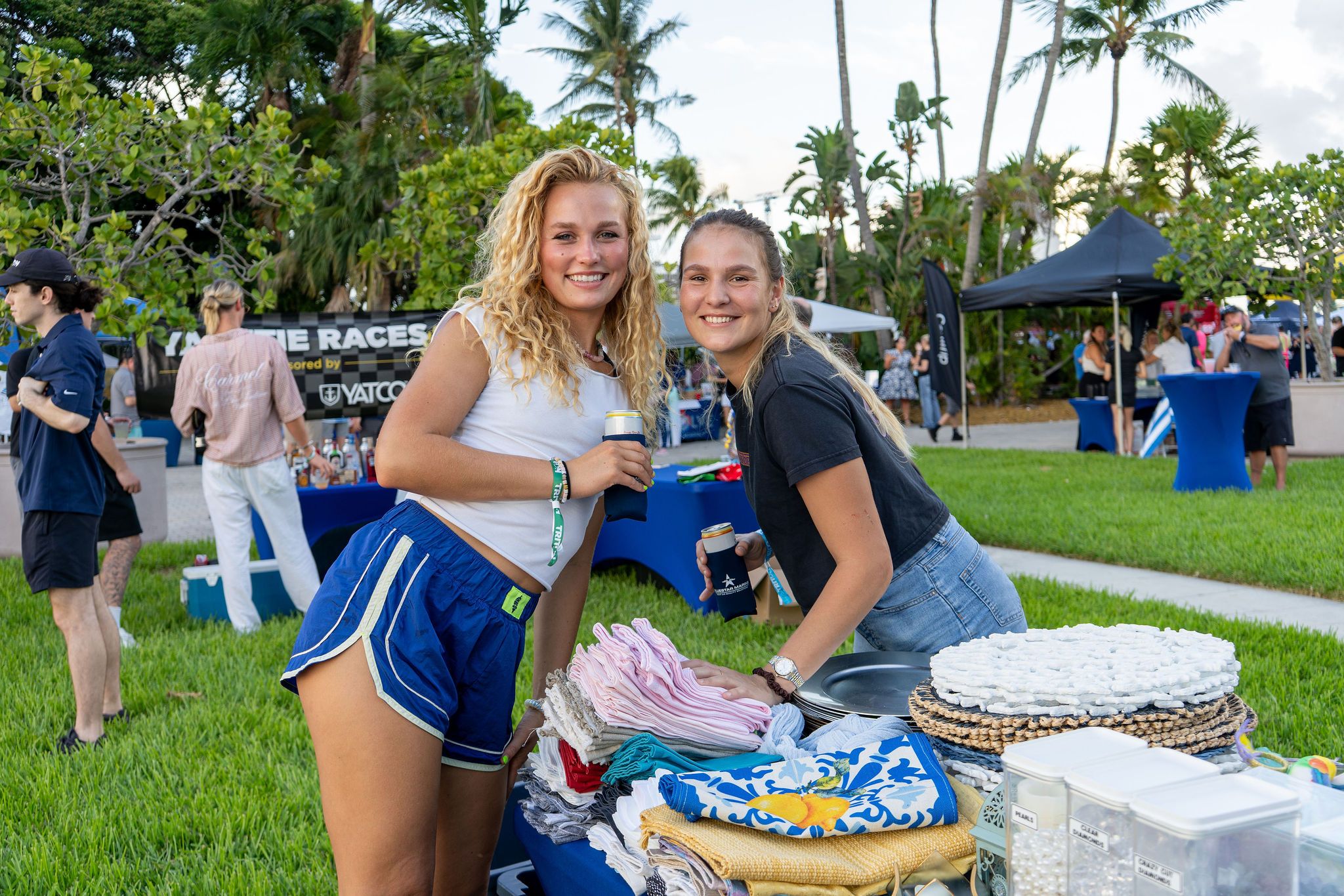 Guests in candid and group photos at The Triton's Fall Triton Expo at Bahia Mar Yachting Center.