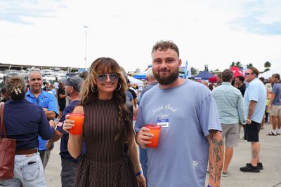 Guests networking at The Triton's Crew, Captains & Connections event at Nautical Ventures Marina.