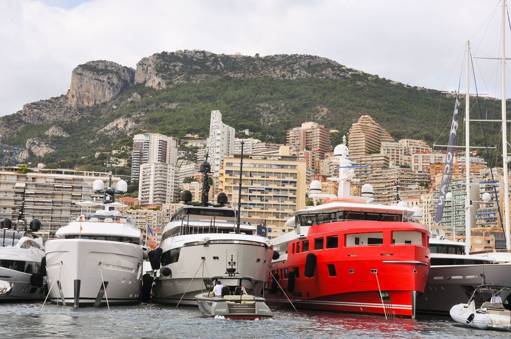 Yachts and crew on the docks at the 2026 Monaco Yacht Show in Port Hercule, Monaco.