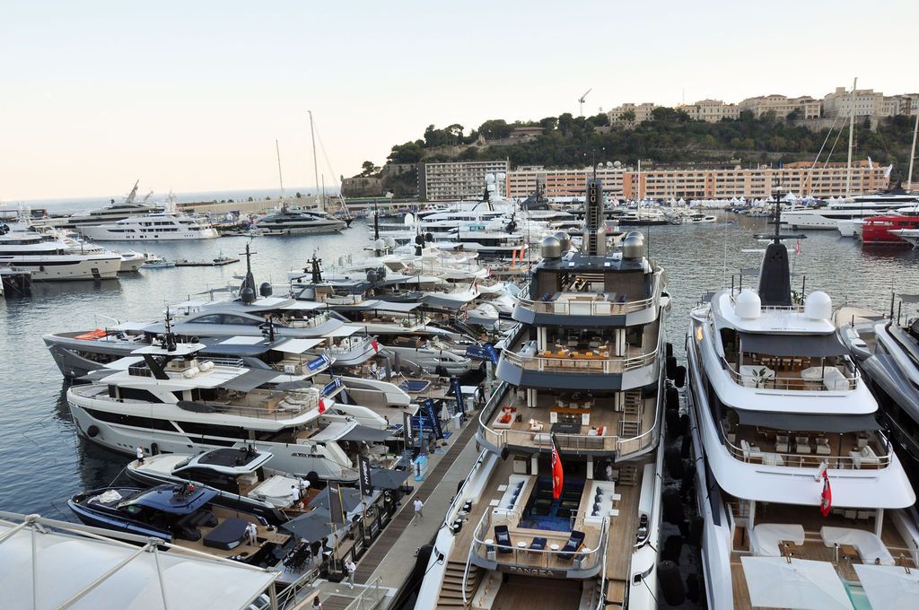 Yachts and crew on the docks at the 2026 Monaco Yacht Show in Port Hercule, Monaco.