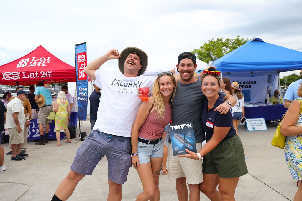 Guests networking at The Triton's Crew, Captains & Connections event at Nautical Ventures Marina.