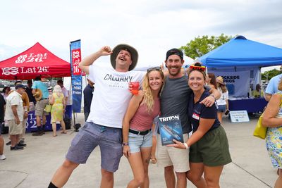 Guests networking at The Triton's Crew, Captains & Connections event at Nautical Ventures Marina.
