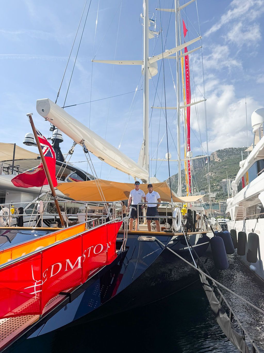 Yachts and crew on the docks at the 2026 Monaco Yacht Show in Port Hercule, Monaco.