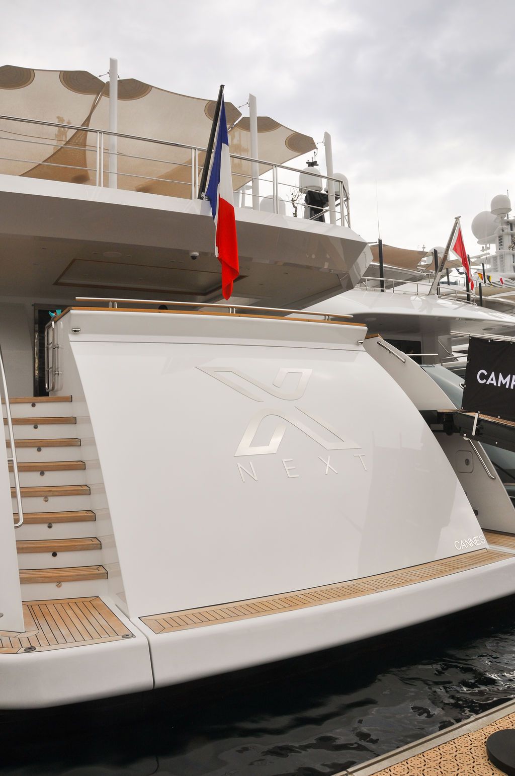 Yachts and crew on the docks at the 2026 Monaco Yacht Show in Port Hercule, Monaco.