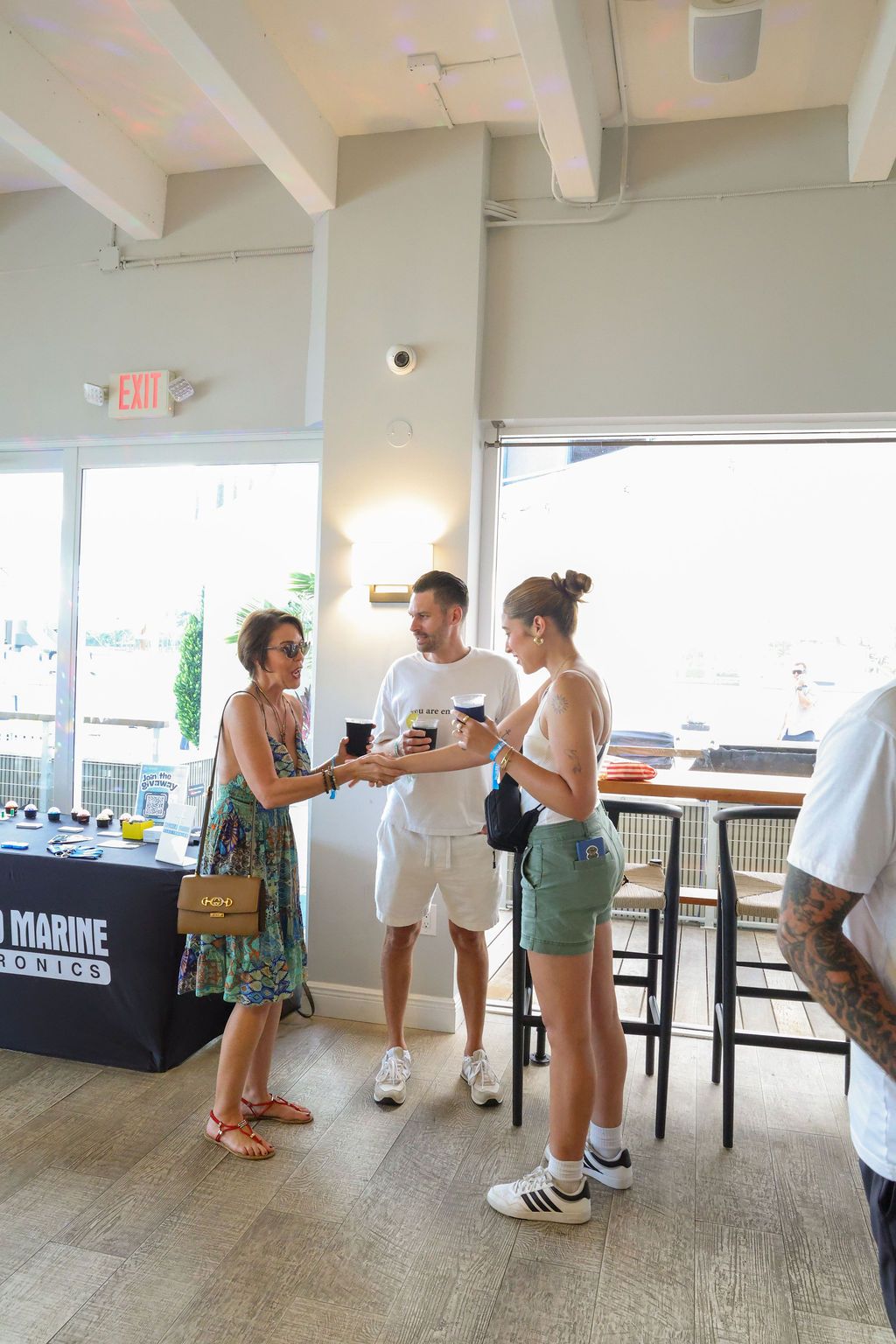 Guests and exhibitors at The Triton's Fall Triton Expo at Bahia Mar Yachting Center.