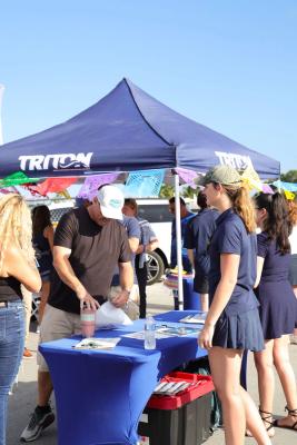 Guests networking at The Triton's Crew, Captains & Connections event at Nautical Ventures Marina.
