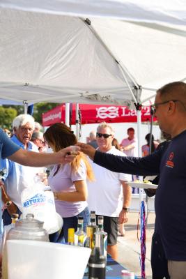 Guests networking at The Triton's Crew, Captains & Connections event at Nautical Ventures Marina.