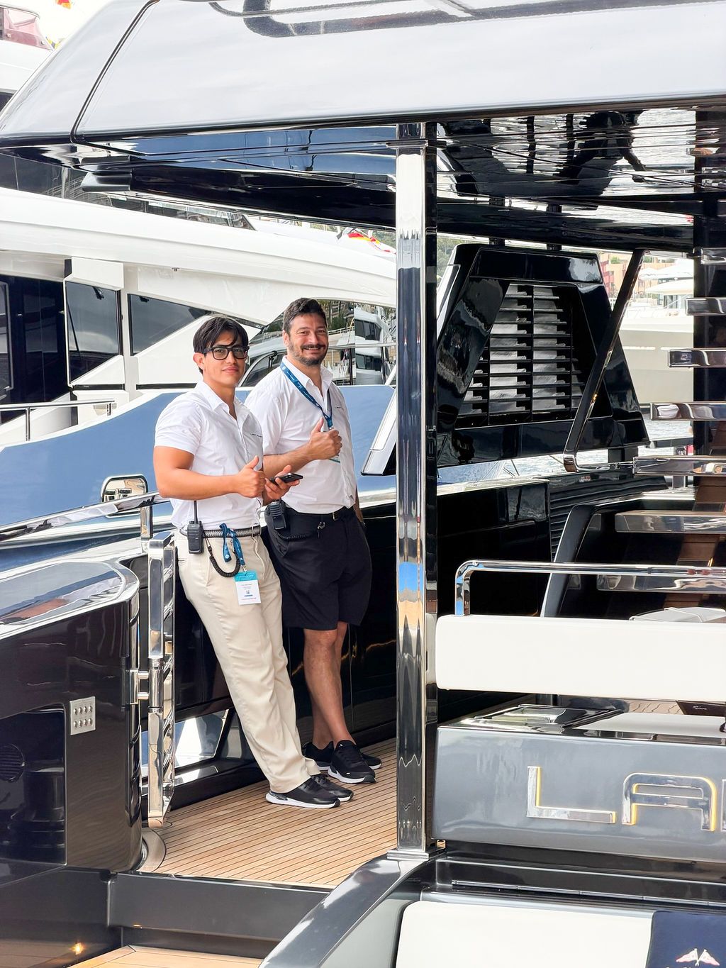 Yachts and crew on the docks at the 2026 Monaco Yacht Show in Port Hercule, Monaco.