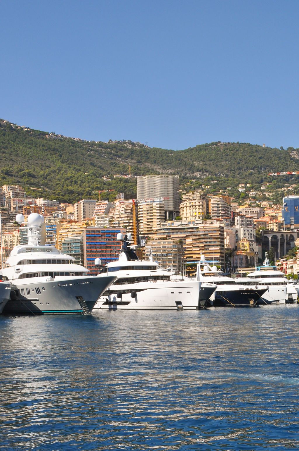 Yachts and crew on the docks at the 2026 Monaco Yacht Show in Port Hercule, Monaco.