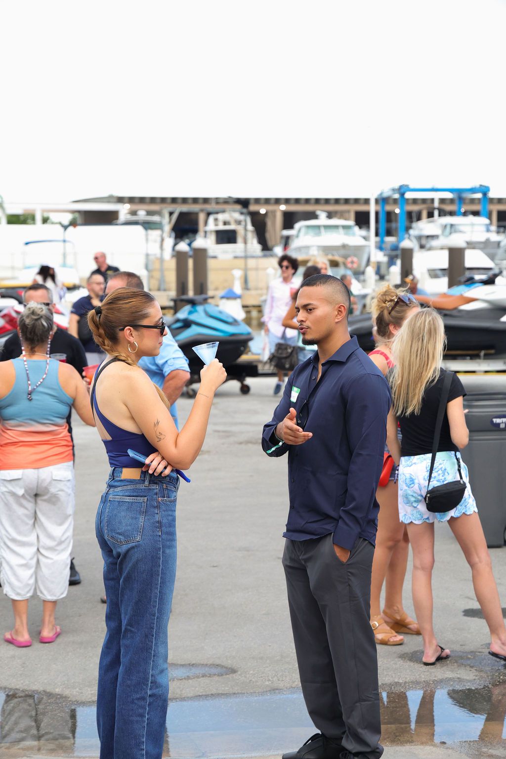 Guests networking at The Triton's Crew, Captains & Connections event at Nautical Ventures Marina.