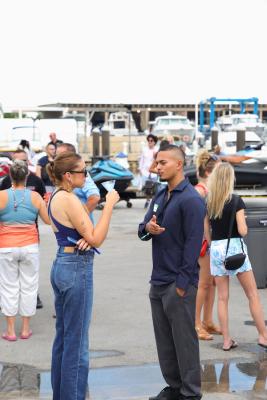 Guests networking at The Triton's Crew, Captains & Connections event at Nautical Ventures Marina.
