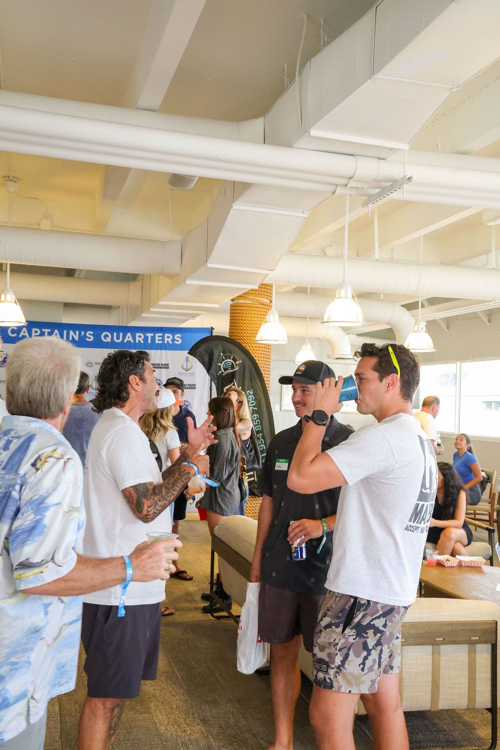 Guests and exhibitors at The Triton's Fall Triton Expo at Bahia Mar Yachting Center.