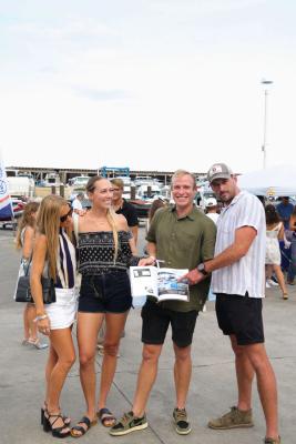 Guests networking at The Triton's Crew, Captains & Connections event at Nautical Ventures Marina.